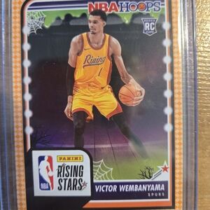 NBA Hoops Rising Stars Victor Wembanyama Rookie Card - Yellow/Orange Jersey